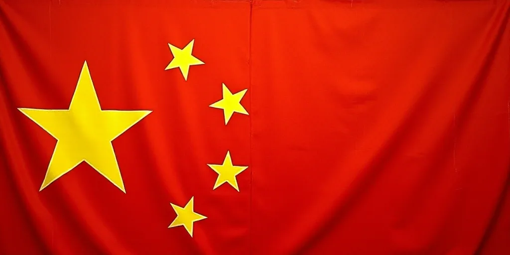 a close up of a flag with a red background and a yellow one with white stars on it and a red one wit