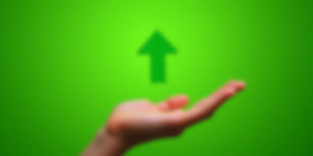a person holding out their hand with a green background and a green arrow symbol in the middle of th
